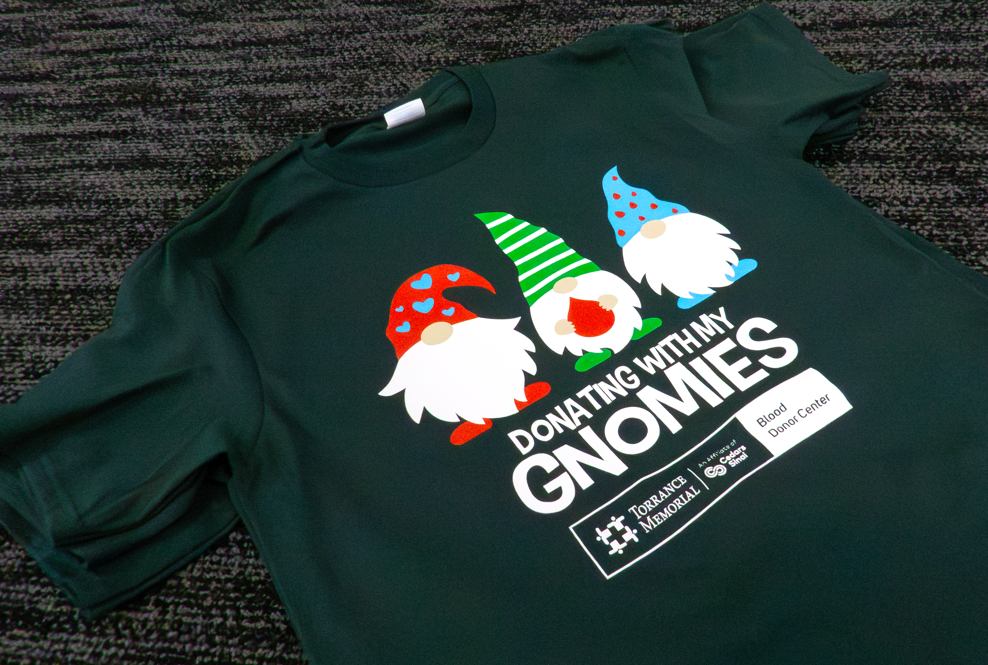 donating with my gnomies shirt design.png__PID:63127b0b-07b1-4ec4-96e7-e8915c860d6d